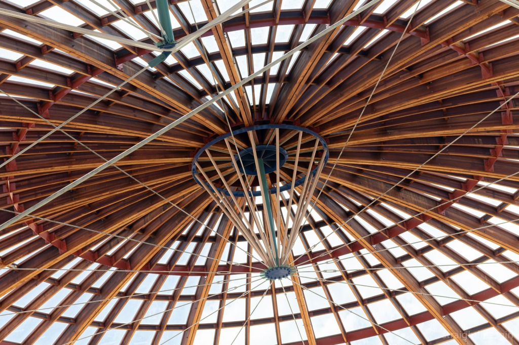 Wooden struts that form the shell of a large dome