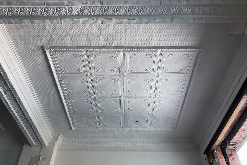 A white pressed tin roof